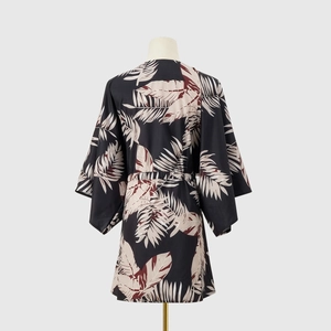 Close-up back view of tropical palm leaf print kimono robe with wide split sleeves