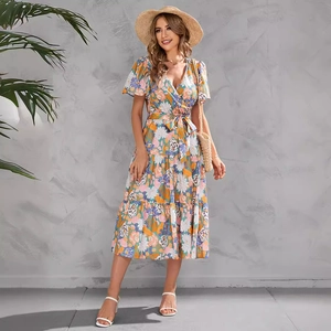 Floral V-neck midi dress with ruffled sleeves and belted waist in summer resort style