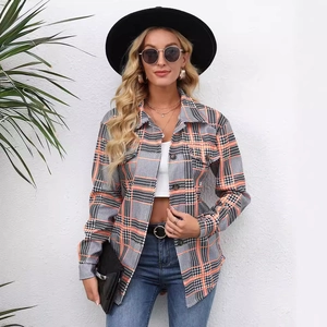 Women's long sleeve plaid shirt with orange and black checkered pattern and button closure