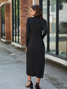 Rear view of sleek black mock neck midi dress with elegant bodycon fit and long sleeves