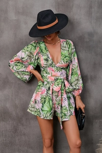 Detail view of V-neck lantern sleeve top and high waist tropical print shorts set