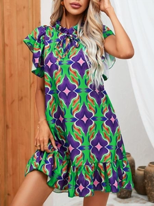 Detail of bohemian floral print dress featuring ruffled sleeves and a drawstring neckline