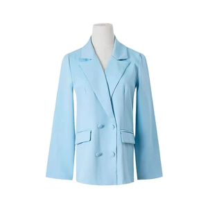 Blazer croisé bleu clair pour femme avec revers en pointe et poches à rabat