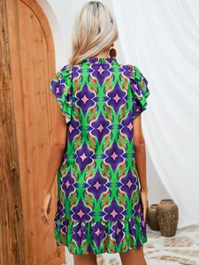 Rear view of floral print summer dress with ruffled collar and flowy sleeves details