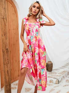 Detail of pink floral maxi dress with bow-tie straps and smocked bodice detail