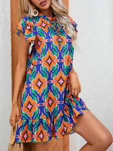 Close-up of bohemian floral print with ruffle sleeves and drawstring neck detail