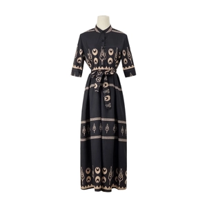 Ethnic print maxi dress with mandarin collar and waist belt on a white mannequin