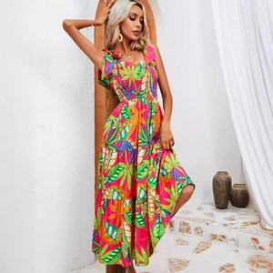 Summer tiered maxi dress with tropical leaf print and smocked waist with shoulder bows