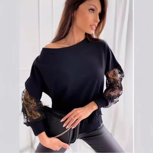 Women's black long sleeve top with lace patchwork sleeves and off-shoulder neckline