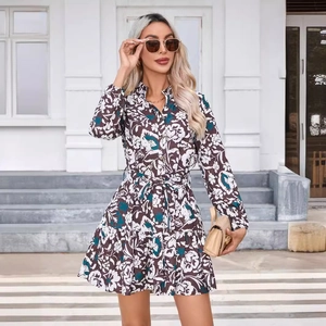 Floral print long sleeve dress with stand collar and belted waist in street style view