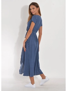 Detail of navy blue polka dot midi dress with short sleeves and waist-cinching cut
