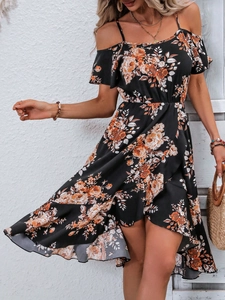 Detail of floral print on cold shoulder summer dress with irregular high-low ruffled hem