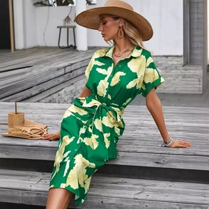 Green summer shirt dress with yellow floral print, button-front and belted waist