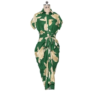 Short sleeve button down dress in dark green with cream leaf print and waist tie