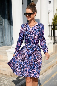Detail of pink and blue leopard print maxi dress featuring a V-neck and button closures