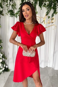 Detailed view of red V-neck dress with layered ruffle sleeves and asymmetric slit hemline
