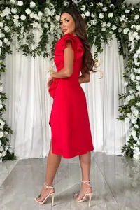 Detail of red V-neck dress featuring unique double-layer ruffle sleeves and slim fit cut
