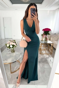 Macro shot of dark green slim-fit dress featuring deep V-neckline and high-slit detail