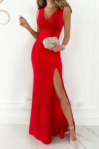 Detailed view of red V-neck sleeveless dress with elegant side slit and ruched waist