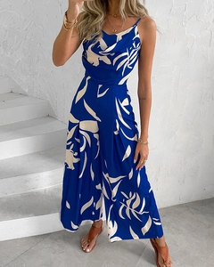 Detail of royal blue floral jumpsuit featuring cowl neck and white leaf pattern print