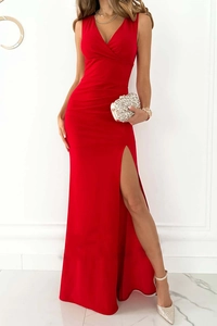 Detail of red V-neck sleeveless evening gown with side slit and waist pleats