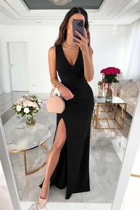 Detail view of a sexy black V-neck sleeveless maxi dress featuring a high side slit