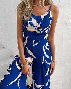 Detail of royal blue and beige geometric print on a sleeveless V-neck wide-leg jumpsuit