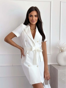 Detail of white double-breasted dress with adjustable waist belt and gold buttons