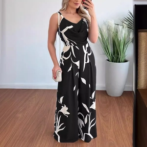 Women's summer jumpsuit featuring black and white leaf print with thin straps and wide legs