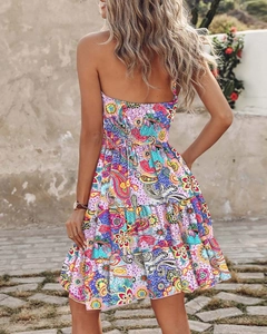 Macro detail of smocked back and multi-layer ruffle hem on paisley floral summer dress