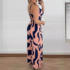 Navy blue and orange geometric print jumpsuit with wide leg and camisole top