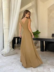Back view of khaki backless maxi dress with V-neck and thin shoulder straps