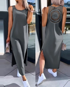 Detail view of dark grey sleeveless maxi dress featuring lace cutout back and side slit hem