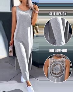 Detail of grey sleeveless maxi dress featuring a side slit and intricate hollow-out back design