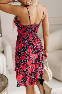 Detail of the smocked back design on a floral print V-neck summer midi dress for women