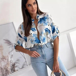Women's white button-down shirt with blue floral print and stylish half-length sleeves