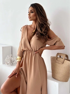 Detail of cross V-neck and tie-up shoulder straps on khaki midi summer dress