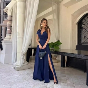 Elegant navy blue deep V-neck maxi evening dress with shoulder bows and high leg slit