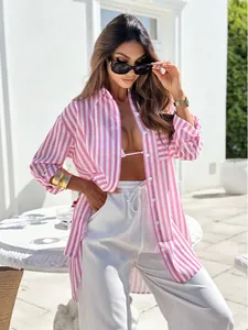 Detail of pink and white striped long sleeve shirt in a relaxed linen-style fabric