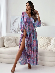 Detail of elegant V-neckline and colorful abstract marble print on maxi dress