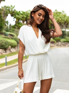 Close-up of white ribbed fabric texture and deep V-neck design on a casual romper