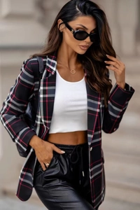Detail of classic plaid blazer with sharp lapels and city style urban fashion tailoring