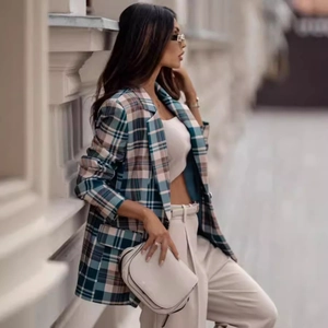 Chic women's plaid blazer in green and beige with classic lapels for professional office wear