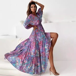 Elegant deep V-neck maxi dress with purple abstract print and tiered cake hemline
