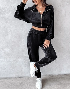 Detailed view of the black velvet two-piece leisure set with zipper jacket and jogger pants