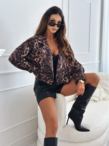Detail of leopard print short jacket with lapel collar and casual loose sleeves fit