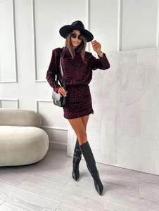 Detail of dark red leopard print bodycon dress with long sleeves and mini hemline