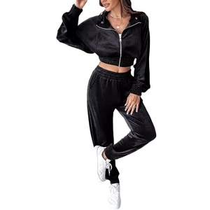 Women's 2-piece black velvet tracksuit with zip-up jacket and high waist joggers