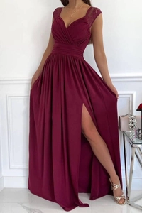 Detailed close-up of burgundy V-neck evening dress with lace shoulders and waist pleats