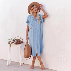 Light blue short sleeve denim shirt dress with button-down front and side slits